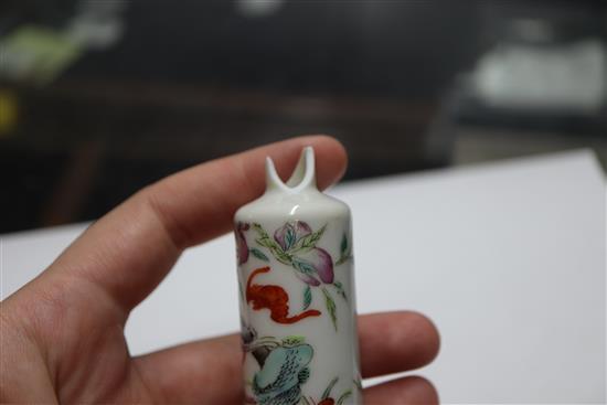 A Chinese malachite snuff bottle and three porcelain snuff bottles, 19th / 20th century (4) Tallest 9cm
